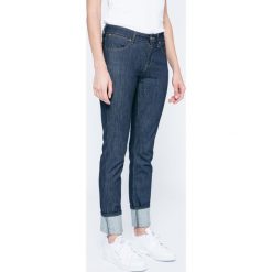 Wrangler - Jeansy. Niebieskie jeansy damskie slim marki Wrangler, z aplikacjami, z elastanu. W wyprzedaży za 139,90 zł.