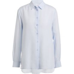 Filippa K HIGH LOW Koszula skylight. Niebieskie tuniki damskie marki Filippa K, m, bez wzorów, z lyocellu, bez kołnierzyka, bez rękawów. W wyprzedaży za 411,75 zł.