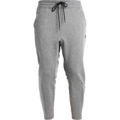 Spodnie dresowe damskie: Nike Sportswear Spodnie treningowe carbon heather/black