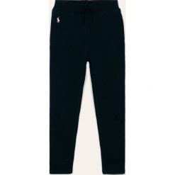 Polo Ralph Lauren - Spodnie dziecięce 128-176 cm. Niebieskie spodnie dziewczęce Polo Ralph Lauren, bez wzorów, z bawełny. W wyprzedaży za 159,90 zł.