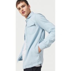 O'Neill Temelpa Koszula Niebieski. Niebieskie koszule męskie O'Neill, xl, bez wzorów, z bawełny, bez kołnierzyka, z długim rękawem. Za 343,95 zł.