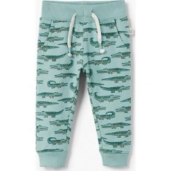 Mango Kids - Spodnie dziecięce Mateopri 80-104 cm. Szare spodnie chłopięce marki Mango Kids, z bawełny. W wyprzedaży za 29,90 zł.