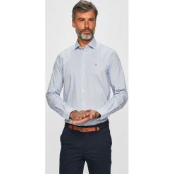 Tommy Hilfiger Tailored - Koszula. Niebieskie koszule męskie Tommy Hilfiger Tailored, bez wzorów, z elastanu, klasyczne, z klasycznym kołnierzykiem, z długim rękawem. W wyprzedaży za 239,90 zł.