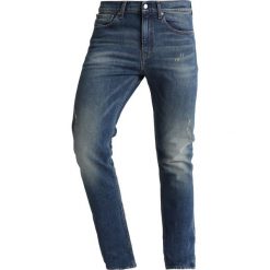 Calvin Klein Jeans 016 SKINNY Jeans Skinny Fit blue denim. Niebieskie jeansy męskie marki Calvin Klein Jeans, z elastanu. Za 589,00 zł.