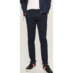 Chinosy męskie: Chinosy slim – Granatowy