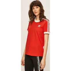 Adidas Originals - T-shirt. Czerwone t-shirty damskie adidas Originals, bez wzorów, z elastanu, z okrągłym kołnierzem. W wyprzedaży za 99,90 zł.