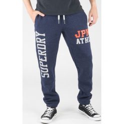 SuperDry Spodnie dresowe Niebieski. Niebieskie spodnie męskie Superdry, xl, bez wzorów, z bawełny. Za 421,95 zł.