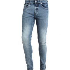 Calvin Klein Jeans 016 SKINNY Jeansy Slim Fit light blue denim. Niebieskie jeansy męskie marki Calvin Klein Jeans, z elastanu. Za 419,00 zł.
