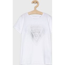 Guess Jeans - Top dziecięcy 118-175 cm. Białe bluzki dziewczęce Guess Jeans, z nadrukiem, z elastanu, z okrągłym kołnierzem, z krótkim rękawem, krótkie, bez kaptura. Za 79,90 zł.