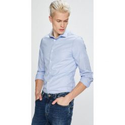 Guess Jeans - Koszula Almeda. Niebieskie koszule męskie Guess Jeans, xl, z aplikacjami, z bawełny, eleganckie, z włoskim kołnierzykiem, z długim rękawem. W wyprzedaży za 189,90 zł.
