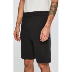 Reebok Classic - Szorty. Czarne spodenki i szorty męskie Reebok Classic, s, bez wzorów, z bawełny, casualowe. W wyprzedaży za 149,90 zł.