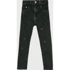 Blukids - Spodnie dziecięce 104-134 cm. Czarne spodnie chłopięce Blukids, bez wzorów, z elastanu, casualowe. W wyprzedaży za 49,90 zł.