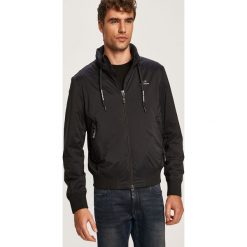 Armani Exchange - Kurtka. Niebieskie płaszcze męskie Armani Exchange, s, bez wzorów, z elastanu, krótkie, z kapturem. W wyprzedaży za 499,90 zł.