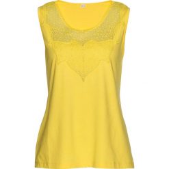 Shirt z koronką bonprix żółty ananasowy. Żółte koszulki damskie bonprix, w koronkowe wzory, z koronki, bez kołnierzyka. Za 49,99 zł.