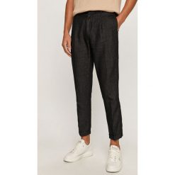 Scotch & Soda - Spodnie. Niebieskie spodnie męskie Scotch & Soda, z haftami, z bawełny. Za 559,90 zł.