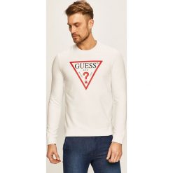 Guess Jeans - Bluza. Białe bluzy męskie Guess Jeans, m, z nadrukiem, z elastanu, z okrągłym kołnierzem, bez rękawów, bez kaptura. W wyprzedaży za 179,90 zł.