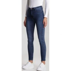 Granatowe Jeansy Skinny Assania. Niebieskie jeansy damskie Renee. Za 99,99 zł.