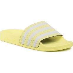 Klapki adidas - adilette EG5005 Yeltin/Ftwwht/Yeltin. Żółte klapki damskie Adidas, bez wzorów, z tworzywa sztucznego, bez obcasa. W wyprzedaży za 119,00 zł.