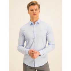 Koszula Emporio Armani 8N1C09 1N06Z 0784. Niebieskie koszule męskie Emporio Armani, xxl, bez wzorów, z elastanu, casualowe, bez kołnierzyka, bez rękawów. W wyprzedaży za 399,00 zł.