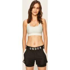 Under Armour - Biustonosz sportowy. Niebieskie biustonosze sportowe damskie Under Armour, xs, z nadrukiem, z dzianiny. W wyprzedaży za 119,90 zł.