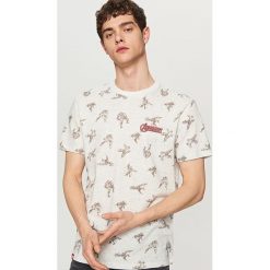 T-shirty męskie: T-shirt z nadrukiem marvel – Kremowy