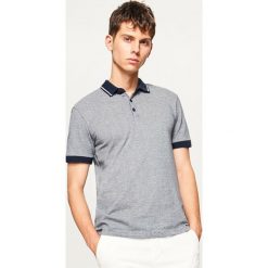 Koszulka polo - Granatowy. Niebieskie koszulki polo marki Reserved, l. W wyprzedaży za 49,99 zł.