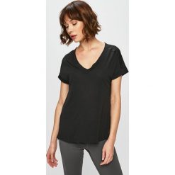 Reebok - Top. Czarne topy damskie Reebok, s, bez wzorów, z poliesteru, bez kołnierzyka. W wyprzedaży za 79,90 zł.