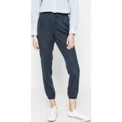 Tommy Jeans - Spodnie. Szare bryczesy damskie Tommy Jeans, m, z jeansu. W wyprzedaży za 219,90 zł.