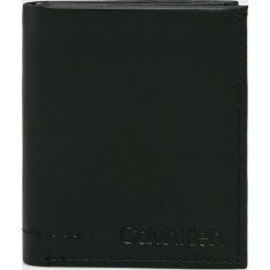 Calvin Klein - Portfel skórzany. Czarne portfele męskie Calvin Klein, bez wzorów, ze skóry. Za 279,90 zł.