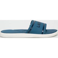 Lacoste - Klapki. Niebieskie klapki damskie Lacoste, bez wzorów, z gumy, bez obcasa, na obcasie. W wyprzedaży za 149,90 zł.