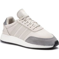 Buty adidas - I-5923 BD7805 Raw White/Raw White/Grey Three. Brązowe półbuty męskie Adidas, na co dzień, bez wzorów, ze skóry, bez zapięcia. W wyprzedaży za 339,00 zł.