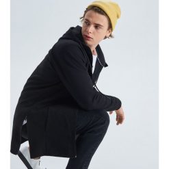 Bluza o dłuższym kroju z zamkami - Czarny. Czarne bluzy męskie Cropp, s, bez wzorów, bez kołnierzyka, bez rękawów, bez kaptura. W wyprzedaży za 49,99 zł.