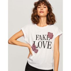 T-shirt z nadrukiem - Biały. Białe t-shirty damskie Reserved, l, z nadrukiem. Za 29,99 zł.