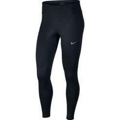 Legginsy do biegania damskie NIKE THRMA TIGHT / 856155-010. Czarne spodnie damskie Nike, bez wzorów, do biegania. Za 199,00 zł.