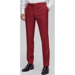 Spodnie LEONARDO GDTS900365. Czerwone spodnie garniturowe męskie Giacomo Conti, m, bez wzorów, z wełny, eleganckie. Za 699,00 zł.