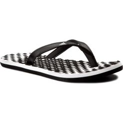Japonki adidas - Eezay Dots W B23738 Ftwwht/Cblack/Cblack. Czarne klapki damskie Adidas, bez wzorów, ze skóry ekologicznej, bez obcasa. Za 89,00 zł.