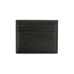 Portfele Calvin Klein Jeans K50K504465 BURN CARDHOLDER. Czarne portfele męskie Calvin Klein Jeans, bez wzorów, z jeansu. Za 179,67 zł.