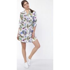 Wzorzysta sukienka. Szare sukienki damskie Made in Poland, bez wzorów, z poliesteru, bez kołnierzyka, bez rękawów. Za 219,00 zł.