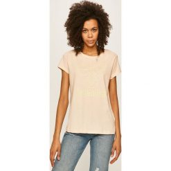 Hummel - T-shirt. Białe bluzki damskie Hummel, s, z nadrukiem, z bawełny, casualowe, z okrągłym kołnierzem. Za 69,90 zł.