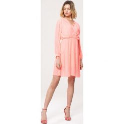 Pomarańczowa Sukienka Lock It. Pomarańczowe sukienki damskie marki Born2be, s, z aplikacjami, bez kołnierzyka, bez rękawów, długie, mini. Za 79,99 zł.