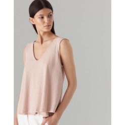 Top oversize - Różowy. Różowe topy damskie Mohito, s, bez wzorów, bez kołnierzyka. W wyprzedaży za 29,99 zł.