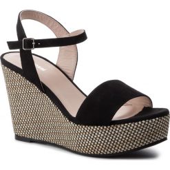 Espadryle GINO ROSSI - Tai DNI381-442-4900-990-0 99. Czarne espadryle damskie Gino Rossi, bez wzorów, ze skóry, bez obcasa, na obcasie. W wyprzedaży za 299,00 zł.