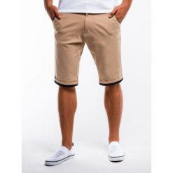 Krótkie spodenki męskie chino W150 - beżowe. Brązowe spodenki i szorty męskie Ombre Clothing, s, bez wzorów, z bawełny, klasyczne, krótkie. Za 39,00 zł.