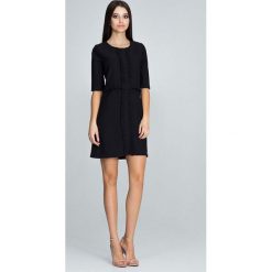 Czarna Elegancka Krótka Sukienka z Falbankami. Czarne sukienki dziewczęce Molly.pl, bez wzorów, eleganckie, z krótkim rękawem, krótkie, mini, dopasowane. Za 139,90 zł.