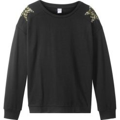 Bluza z gwiazdami z cekinów bonprix czarny. Czarne bluzy dziewczęce bonprix, bez wzorów, bez rękawów, bez kaptura. Za 37,99 zł.