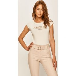 Morgan - T-shirt. Czarne bluzki damskie Morgan, s, z aplikacjami, z dzianiny, casualowe, z okrągłym kołnierzem, z krótkim rękawem. Za 129,90 zł.