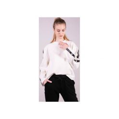 Bluzka sportowa z lampasem MONICA-Ecri. Białe bluzki sportowe damskie 3 for u, s, bez wzorów, z bawełny, z klasycznym kołnierzykiem, bez rękawów, bez kaptura, do biegania. Za 111,30 zł.