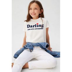 Mango Kids - T-shirt dziecięcy Darling 110-164 cm. Białe bluzki dziewczęce Mango Kids, z nadrukiem, z bawełny, z okrągłym kołnierzem, z krótkim rękawem, krótkie, bez kaptura. Za 35,90 zł.