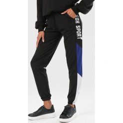 Czarno-Niebieskie Spodnie Elinnaya. Czarne spodnie damskie Born2be, s, z dresówki. Za 79,99 zł.