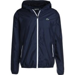 Kurtki sportowe męskie: Lacoste Sport WINDBREACKER Kurtka hardshell navy blue/white